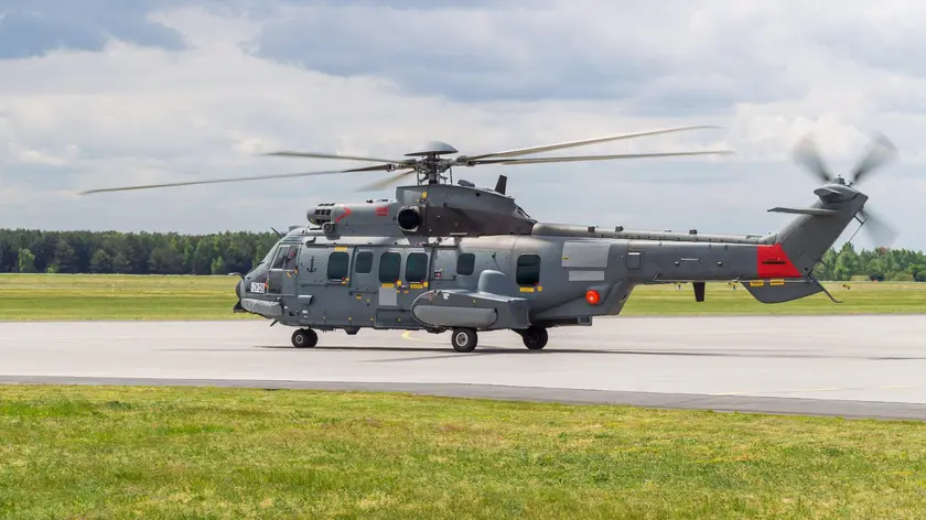 epa04770139 A long-range tactical multipurpose helicopter 'Eurocopter EC-725 Caracal' (also called 'Super Cougar') is about to take off at the 33rd Airlift Base in Powidz, near Poznan, Poland, 27 May 2015 after it passed verification tests. Negotiations on an offset agreement and a delivery contract for utility helicopters for the Polish Armed Forces are now expected to start. There has been protests recently of workers of Polish helicopter producer PZL-Swidnik against the tender for the supply of new military helicopters for the Polish Army. In April 2015 the Polish Defence Ministry had decided to purchase the H225M Caracal helicopter from Airbus Helicopters for the Polish Armed Forces while an PZL-Swidnik offer was rejected. EPA/PAWEL JASKOLKA POLAND OUT