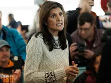 epa11095075 Republican candidate for president former South Carolina Governor Nikki Haley (C) speaks with reporters after meeting with locals at the Beach Plum restaurant in Epping, New Hampshire, USA, 21 January 2024. Haley is battling against opponent former US President Donald Trump following the announcement by Florida Governor Ron DeSantis that he is dropping out of the race in the New Hampshire Republican Primary held on 23 January 2024. EPA/CJ GUNTHER