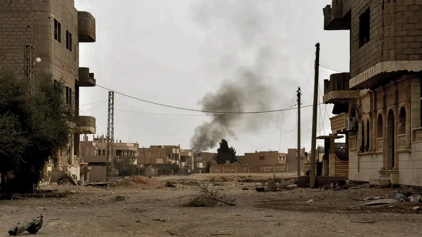 epa06346941 An undated handout photo made available on 23 November 2017 by the Syriaâs Arab News Agency (SANA) showing the damage buildings in the vicinity of Al-Boukamal city in the countryside of Deir Ezzor, Syria. According to SANA Russian strategic bombers destroyed on 17 November command sites, gatherings, and armored vehicles for Daesh (ISIS) terrorist organization in the vicinity of al-Boukamal city in the countryside of Deir Ezzor. The Russian Defense Ministry said in a statement that on November 17th 2017, six Tupolev-22M3 long-range bombers left an airbase in Russia, crossed Iranian and Iraqi airspace, and carried out a massive airstrike against facilities of the terrorist organization Daesh near Abu Kamal, in Syriaâs Deir Ezzor province, and the targets included strongholds, manpower, and armored vehicles. EPA/SANA / HANDOUT HANDOUT EDITORIAL USE ONLY/NO SALES