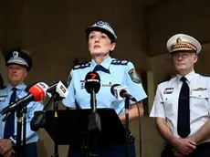 epa11281124 (L-R) NSW Police Deputy Commissioner Peter Thurtell, NSW Police Commissioner Karen Webb, and NSW Ambulance Commissioner Dr Dominic Morgan speak to the media during a press conference at Surry Hills Police Station, in Sydney, Australia, 16 April 2024. A 15-year-old boy has been arrested after a stabbing at an Orthodox Assyrian church in western Sydney which sparked unrest as an angry mob confronted police. EPA/BIANCA DE MARCHI AUSTRALIA AND NEW ZEALAND OUT