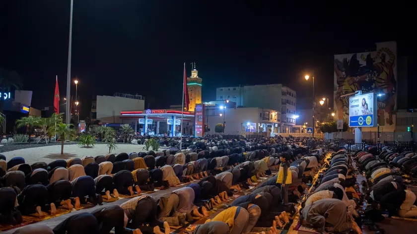 epa10549656 Moroccan Muslims perform an evening prayer called 'Tarawih' during the holy fasting month of Ramadan on one of the largest streets in Rabat, Morocco, 29 March 2023. Muslims around the world celebrate Ramadan by praying during the night time and abstaining from eating, drinking, and sexual acts during the period between sunrise and sunset. Ramadan is the ninth month in the Islamic calendar, and it is believed that the revelation of the first verse in the Koran was during its last ten nights. EPA/Jalal Morchidi