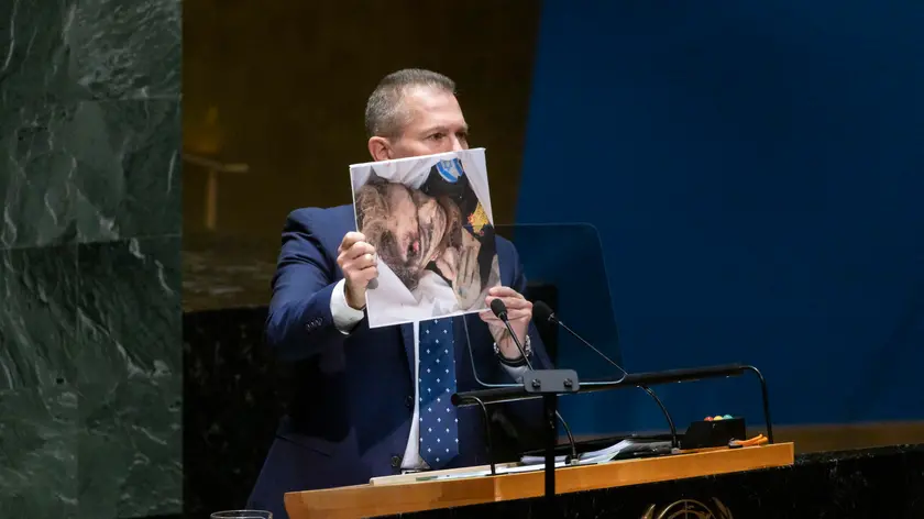 epa10940537 Israeli Ambassador to the United Nations Gilad Erdan holds up a photograph during an emergency session of the UN General Assembly called in response to the ongoing violence between Israel and Hamas in the Gaza Strip at United Nations headquarters in New York, New York, USA, 26 October 2023. EPA/JUSTIN LANE