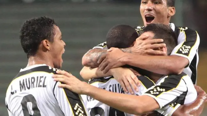 Brazilian defender of Udinese, Gabriel Silva, celebrated by his teammates after scoring the goal during the Uefa Europa League play-off first leg soccer match Udinese Calcio vs FC Slovan Liberec at Nereo Rocco stadium in Trieste, Italy, 22 August 2013. ANSA/ANDREA LASORTE