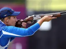 epa03324796 Chiara Cainero of Italy competes in the Women Skeet final during the London 2012 Olympic Games Shooting competition at the Royal Artillery Barracks, south east London, Britain, 29 July 2012. EPA/GEOFF CADDICK