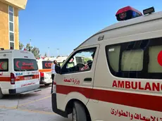epa10956129 Ambulances cross the Rafah border crossing between the Gaza Strip and Egypt to bring injured people, in Rafah, Egypt, 03 November 2023. As per the agreement made by Egypt, Israel, and Hamas, a number of foreign nationals and individuals with critical injuries will be permitted to evacuate the besieged territory. More than 8,500 Palestinians and at least 1,400 Israelis have been killed, according to the Israel Defense Forces (IDF) and the Palestinian health authority, since Hamas militants launched an attack against Israel from the Gaza Strip on 07 October, and the Israeli operations in Gaza and the West Bank which followed it. EPA/STRINGER