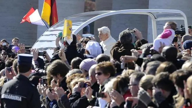 Pope Benedict XVI greets the faithful during his last General Audience in St. Peter's square, Vatican,27 February 2013. ANSA/MAURIZIO BRAMBATTI