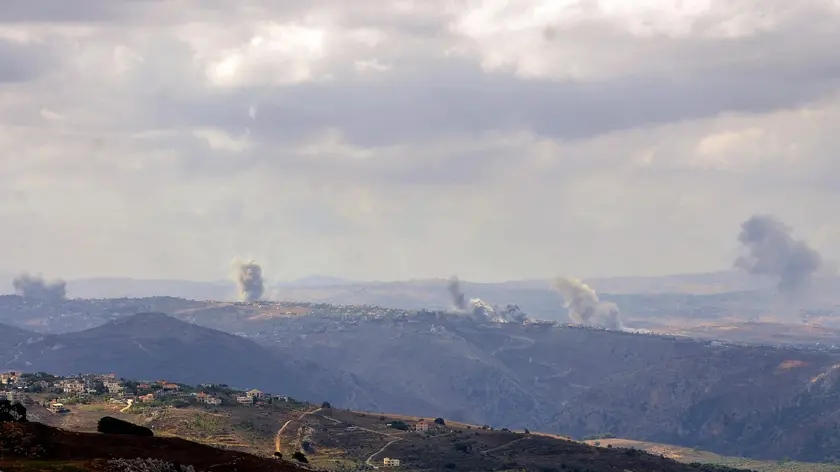 epa11620780 Smoke billows from the site of Israeli airstrikes near Lebanese villages, as seen from Marjaayoun, southern Lebanon, 23 September 2024. According to the Lebanese National News Agency (NNA), Israeli aircraft have reportedly carried out a number of bombings on communities in the Marjayoun district in the Nabatieh Governorate of Lebanon, including Taybeh, Houla, Tallouseh, Kfarkela, Mays al-Jabal, Khiyam and Bani Hayan. The Israeli military urged civilians in areas where Hezbollah operates to leave, saying they launched 'extensive' airstrikes on Hezbollah targets in Lebanon on 23 September 2024. According to Lebanon's Ministry of Health, at least 182 people have been killed and more than 720 others injured following continued Israeli airstrikes on southern Lebanese towns and villages since 23 September morning. EPA/STRINGER