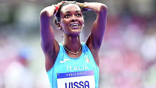 epa11537490 Sintayehu Vissa of Italy reacts after clocking a new Italian national record in the Women 1500m semifinal of the Athletics competitions in the Paris 2024 Olympic Games, at the Stade de France stadium in Saint Denis, France, 08 August 2024. EPA/ANNA SZILAGYI