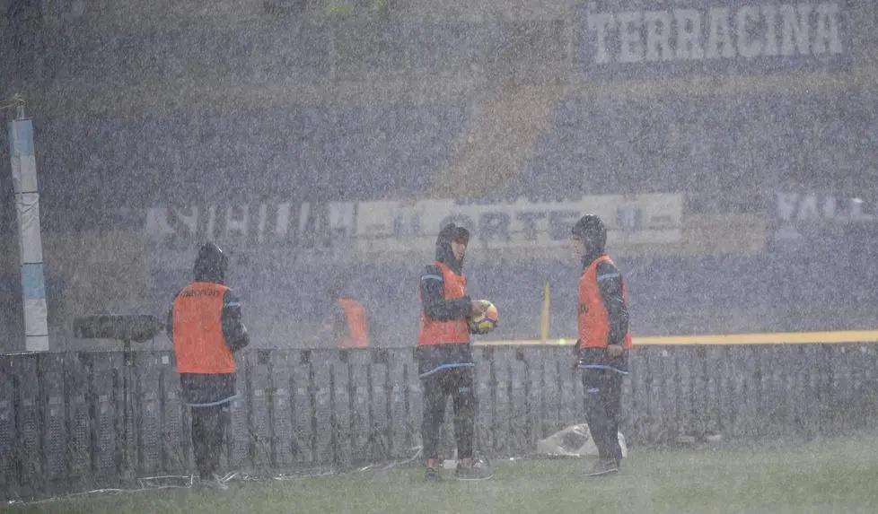 Ball boys are seen during an heavy rain prior to the Serie A Soccer match SS Lazio vs Udinese Calcio at Olimpico Stadium in Rome, 05 November 2017. The start of the match is postponed due to heavy rain. ANSA/CLAUDIO PERI