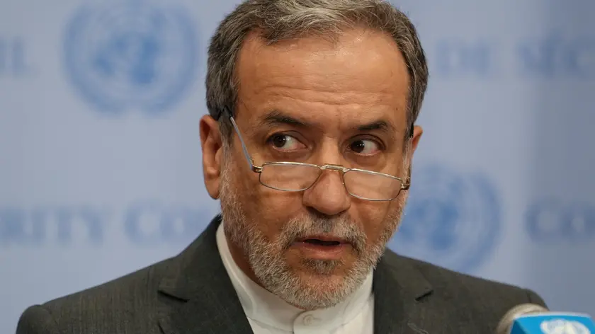 epa11625110 Foreign Minister of Iran Abbas Araghchi addresses members of the press before an emergency United Nations Security Council meeting called to address the rising tensions between Israel and Lebanon during the General Debate of the 79th session of the United Nations General Assembly in New York, New York, USA, 25 September 2024. EPA/STEPHANI SPINDEL
