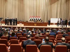 epa11351549 A handout photo made available by the Iraqi Parliament Media Office shows Members of Iraqi parliament attend a session to elect a new parliament speaker in Baghdad, Iraq, 18 May 2024. The Iraqi Parliament was unable to elect a new speaker in the second round of voting. The candidates, MPs Salem Al-Issawi and Mahmoud Al-Mashhadani, engaged in a close contest, with Al-Issawi receiving 158 votes and Al-Mashhadani 137 votes. The interim Parliament Presidency announced the postponement of the session until further notice, following a dispute between a number of Sunni representatives inside the meeting hall. EPA/IRAQI PARLIAMNET MEDIA OFFICE / HANDOUT HANDOUT EDITORIAL USE ONLY/NO SALES HANDOUT EDITORIAL USE ONLY/NO SALES