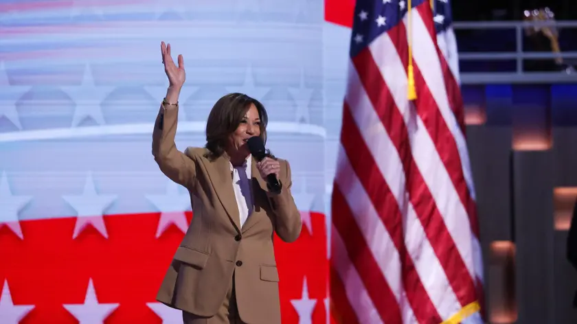 epa11555843 US Vice President Kamala Harris addresses the audience on the opening night of the Democratic National Convention (DNC) at the United Center in Chicago, Illinois, USA, 19 August 2024. The 2024 Democratic National Convention is being held 19 to 22 August 2024 in which delegates of the United States' Democratic Party will vote on the party's platform and ceremonially vote for the party's nominees for president and vice president, Vice President Kamala Harris and Governor Tim Walz of Minnesota, for the upcoming presidential election. EPA/JUSTIN LANE