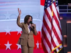 epa11555843 US Vice President Kamala Harris addresses the audience on the opening night of the Democratic National Convention (DNC) at the United Center in Chicago, Illinois, USA, 19 August 2024. The 2024 Democratic National Convention is being held 19 to 22 August 2024 in which delegates of the United States' Democratic Party will vote on the party's platform and ceremonially vote for the party's nominees for president and vice president, Vice President Kamala Harris and Governor Tim Walz of Minnesota, for the upcoming presidential election. EPA/JUSTIN LANE