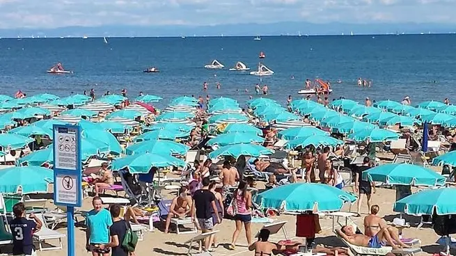 Lignano 17 Agosto 2014. Spiaggia a Pineta. © Petrussi Foto Press Srl Udine
