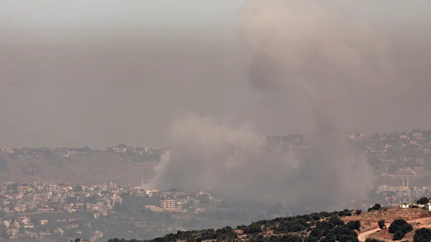 epa11421804 Smoke rises as a result of an Israeli air strike in the southern Lebanese town of Khiam, as seen from an area near Kiryat Shmona, northern Israel, 19 June 2024. The Israeli military stated on 18 June that its Northern Command approved operational plans for an offensive in Lebanon amid increased readiness of its troops in the field. The announcement came after the Lebanese militant group Hezbollah published a video showing Israeli military and civilian locations in Israel. 'In an all-out war, Hezbollah will be destroyed and Lebanon will be severely hit', Israeli Foreign Minister, Israel Katz, said on social media. EPA/ATEF SAFADI