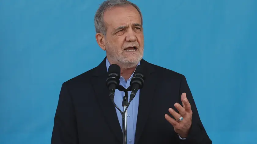 epa11616681 Iranian president Masoud Pezeshkian speaks during the annual military parade marking the Iraqi invasion in 1980, which led to an eight-year-long war (1980-1988); in Tehran, Iran, 21 September 2024. According to IRNA newes agency, Iranian president Masoud Pezeshkian said 'our defense system power is on that level that no enemy even dares to think to attack against Iran, and we will continue to develop our defense system in any aspects.' EPA/ABEDIN TAHERKENAREH