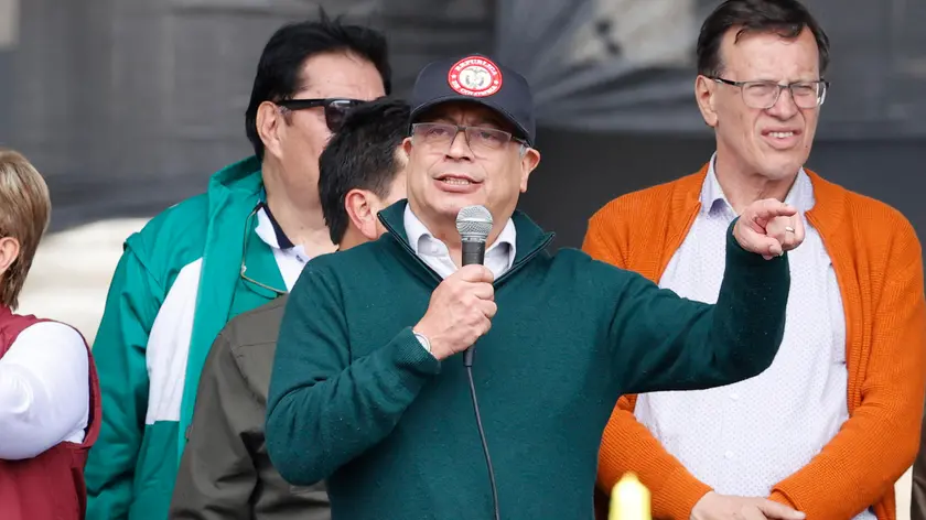 epa11313163 Colombia's President Gustavo Petro (C) speaks at the end of a march to mark International Workers' Day in Bolivar Square in Bogota, Colombia, 01 May 2024. Petro announced in a speech to workers that he will break relations with Israel on 02 May over what he called "genocide" against the Palestinian people. 'Here in front of you, the government of change, the president of the Republic, informs that tomorrow diplomatic relations with the State of Israel will be broken … for having a government, for having a genocidal president,' Petro said at the event in Bogota. EPA/Mauricio Duenas Castaneda
