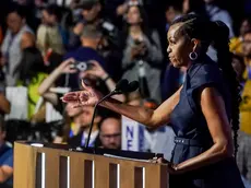 epa11557365 Former First Lady of the United States Michelle Obama speaks on the second night of the Democratic National Convention (DNC) at the United Center in Chicago, Illinois, USA, 20 August 2024. The 2024 Democratic National Convention is being held from 19 to 22 August 2024, during which delegates of the United States' Democratic Party will vote on the party's platform and ceremonially vote for the party's nominee for president, Vice President Kamala Harris, and for vice president, Governor Tim Walz of Minnesota, for the upcoming presidential election. EPA/WILL OLIVER