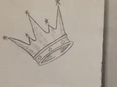 La copertina del manuale di iniziazione sequetrato a sette giovani riconducibili ai Latin king, una delle gang storiche di giovani sudamericani, 24 marzo 2014. I giovani sono stati fermati in un giardino pubblico a Milano. ANSA/SALVATORE GARZILLO