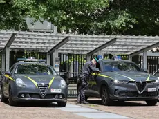 Il nucleo di polizia economico-finanziaria della Guardia di Finanza nella sede di Fondazione Milano-Cortina 2026 a Milano, 21 maggio 2024. ANSA/Davide Canella