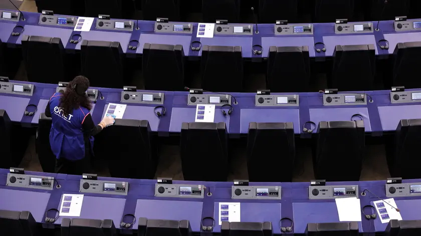 epa11611103 A cleaning worker prepares the hemicycle before the beginning of the key debate on 'The devastating floods in Central and Eastern Europe, the loss of lives and the EU's preparedness to act on such disasters exacerbated by climate change' as part of the plenary session at the European Parliament in Strasbourg, France, 18 September 2024. EU parliamentarians in a key debate on 18 September are addressing the severe flooding brought by Storm Boris, which has claimed at least 20 lives so far across central and eastern Europe since 13 September. They are focusing on the EU's ability to respond effectively to the increasing frequency and severity of climate-related disasters. The current plenary session takes place in Strasbourg from 16 to 19 September 2024. EPA/TERESA SUAREZ