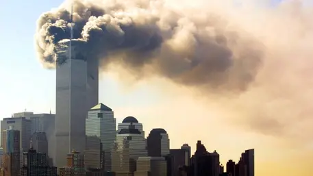 FFM08 - 20020902 - NEW YORK, UNITED STATES : (FILES) An across-the-river view of Manhattan showing huge palls of smoke billowing from the twin towers of the World Trade Centre 11 September 2001 following the terrorist attack on the buildings by two hijacked commercial airplanes. Last year's terrorist attacks on the World Trade Center and the Pentagon, killing about 3.000 people, lead to the massive strike on Osama bin-Laden's terrorist network al-Qaida in Afghanistan and all over the world. (ORIGINALLY ISSUED AS FKM16) EPA PHOTO DPA FILES / HUBERT MICHAEL BOESL