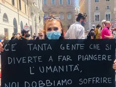 Una manifestante a Roma (foto Luisa Mosello)