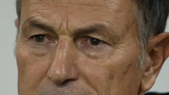 Albania's head coach Giovanni De Biasi looks on before their World Cup Group E qualifying soccer match against Slovenia, in Ljubljana, Slovenia, Friday, Sept. 6, 2013. (AP Photo/Darko Bandic)