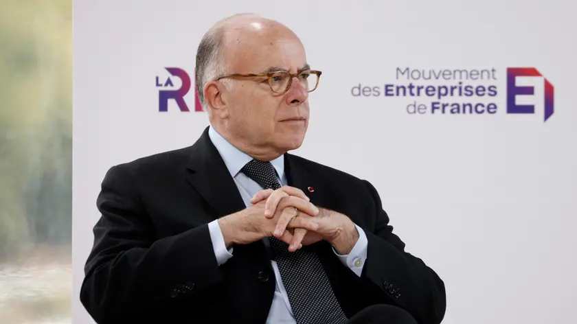 epa10147487 Former French Prime Minister Bernard Cazeneuve addresses during debate on Independence and Autonomy at the Medef Summer Conference, La REF 2022, at the Hippodrome de Longchamp racetrack in Paris, France, 30 August 2022. EPA/YOAN VALAT