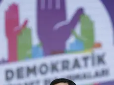 epa05346975 Turkish deputy Selahattin Demirtas, co-leader of the left-wing pro-Kurdish Peoples' Democratic Party (HDP), speaks during a rally for a bill lifting the immunity for certain lawmakers, in Istanbul, Turkey, 05 June 2016. Kurdish HDP lawmakers face having their immunity lifted claiming it is an attempt by the AKP to consolidate more power for itself. The AKP claims the HDP is the political wing of the Kurdistan Workers' Party (PKK) and that its MPs should therefore be criminally investigated. EPA/SEDAT SUNA