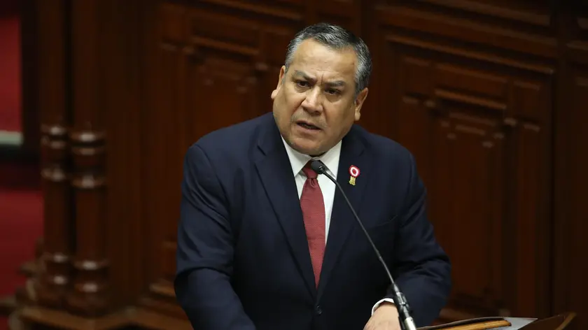 epa11257175 Peru's Prime Minister Gustavo Adrianzen speaks to ask for a vote of confidence during a session of the Congress in Lima, Peru, 03 April 2024. Adrianzen addressed the session to request a vote of confidence and present the management guidelines, a constitutional requirement to continue in office. Peru is experiencing a new political crisis after the Peruvian authorities raided the Peruvian President Diana Boluarte's home as part of an investigation for alleged illicit enrichment and the six changes in the cabinet. EPA/PAOLO AGUILAR
