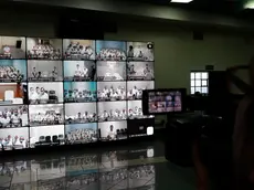 epa11137804 Monitors shows gang members during a simultaneous virtual hearing in different prisons at the Isidro Menendez judicial center, in San Salvador, El Salvador, 08 February 2024. A court in El Salvador held one of the first virtual hearings against 492 leaders of the Mara Salvatrucha (MS13) gang, including historical leaders, for more than 37,000 crimes, in the midst of the 'war against gangs' of the Salvadoran Government. EPA/RODRIGO SURA