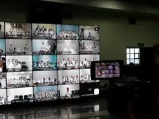 epa11137804 Monitors shows gang members during a simultaneous virtual hearing in different prisons at the Isidro Menendez judicial center, in San Salvador, El Salvador, 08 February 2024. A court in El Salvador held one of the first virtual hearings against 492 leaders of the Mara Salvatrucha (MS13) gang, including historical leaders, for more than 37,000 crimes, in the midst of the 'war against gangs' of the Salvadoran Government. EPA/RODRIGO SURA