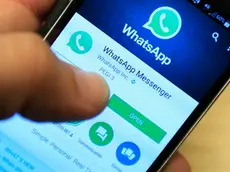 File photo dated 06/04/16 of Whatsapp being used on a smartphone. Businesses could soon be able to target WhatsApp users following surprise changes to the messaging app's privacy policy. PRESS ASSOCIATION Photo. Issue date: Thursday August 25, 2016. The Facebook-owned message service, which is otherwise known for its end-to-end encryption and stringent privacy terms, assured users in a blog post Thursday that their phone numbers would not be made public and that messages would remain encrypted. See PA story CITY WhatsApp. Photo credit should read: Jonathan Brady/PA Wire
