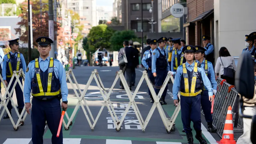 epa10930521 Police forces control access to the Embassy of Israel during a rally against Israel's military operations in Gaza in Tokyo, Japan, 21 October 2023. Thousands of Israelis and Palestinians have died since the militant group Hamas launched an unprecedented attack on Israel from the Gaza Strip on 07 October 2023, and the Israeli strikes on the Palestinian enclave which followed it. EPA/FRANCK ROBICHON