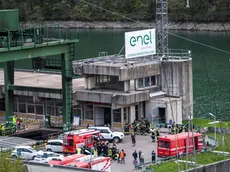 epa11268277 Rescuers work at the scene of an explosion that occurred in a hydroelectric power plant on the Lake Suviana reservoir, near Bologna, northern Italy, 09 April 2024. Four people were confirmed dead and several missing after a fire and an underwater explosion at a hydroelectric power station in the mountains near Bologna on 09 April, according to the Bologna prefecture. EPA/MICHELE LAPINI