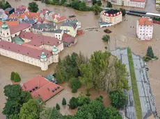 epaselect epa11606212 An aerial picture taken with a drone shows flooded Klodzko, southwestern Poland, 15 September 2024. The southern regions of Poland are experiencing record rainfall and severe flooding caused by heavy rains from the Genoese depression "Boris", which reached Poland on Thursday, September 12. People in flooded areas of the region are being forced to evacuate, and water is flooding villages and towns. River levels are at or above alarming levels. Poland's prime minister confirmed on September 15 that one person had died as a result of the flooding. EPA/MACIEJ KULCZYNSKI POLAND OUT