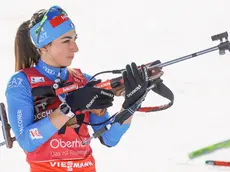 epa10468129 Lisa Vittozzi of Italy at the shooting range during zeroing ahead of the Women's 15km race at the IBU Biathlon World Championships in Oberhof, Germany, 15 February 2023. EPA/RONALD WITTEK