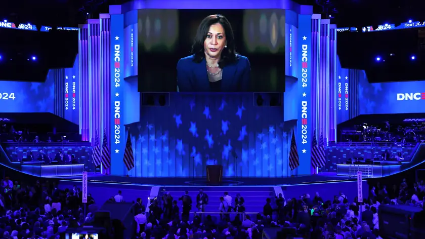 epa11560514 Democratic presidential candidate Kamala Harris is seen on a monitor ahead of the final night of the Democratic National Convention (DNC) at the United Center in Chicago, Illinois, USA, 22 August 2024. The 2024 Democratic National Convention is being held 19 to 22 August 2024 in which delegates of the United States' Democratic Party approved the party's platform and ceremonially voted for the party's nominees for president and vice president, Vice President Kamala Harris and Governor Tim Walz of Minnesota, for the upcoming presidential election. EPA/MICHAEL REYNOLDS