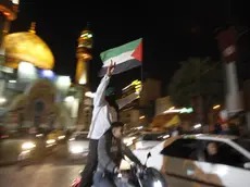 epa11277375 Iranians celebrate after Iran launched drone attacks against Israel at Palestine Square in Tehran, Iran, early morning of 14 April 2024. Iran's Islamic Revolutionary Guards Corps (IRGC) launched drones and rockets towards Israel late on 13 April 2024, Iranian officials said. EPA/ABEDIN TAHERKENAREH