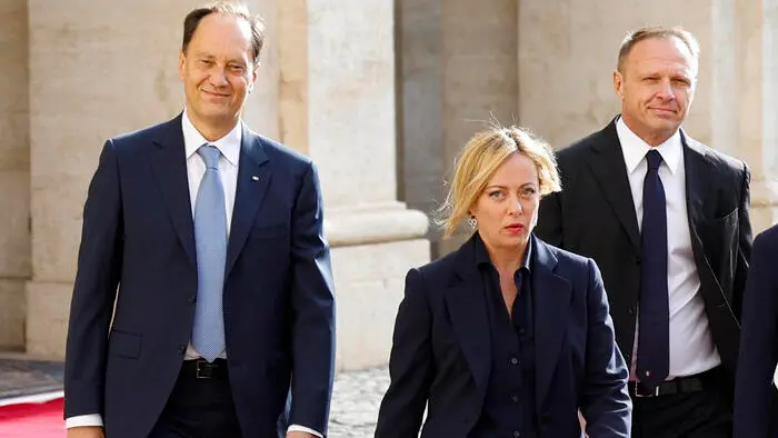 Leader of ‘Fratelli d'Italia’ party Giorgia Meloni (C) arrives for a meeting with Italian President Sergio Mattarella for the first round of formal political consultations for new government at the Quirinale Palace in Rome, Italy, 21 October 2022. ANSA/FABIO FRUSTACI