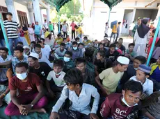 epa10984015 Rohingya refugees take a rest in a temporary shelter after landing on a beach at Kulee Village, Pidie, Indonesia, 19 November 2023. According to local police, another group of 240 Rohingya refugees, including women and children, landed on the beach in Indonesia's Aceh province on 19 November following another recent arrival of a group of 194 people on 14 November 2023. Aceh is one of the transit areas for Rohingya refugees before they continue their journey to other countries such as Malaysia and Australia. EPA/HOTLI SIMANJUNTAK