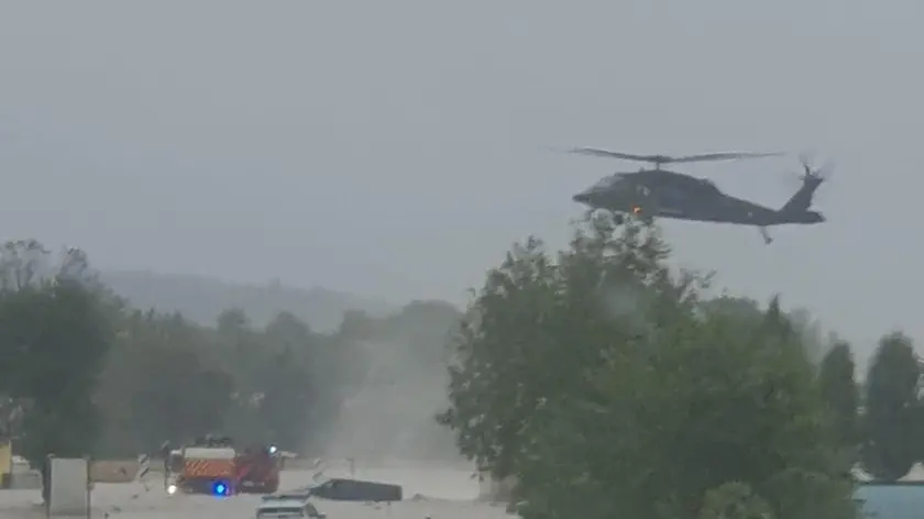 epa11606111 A handout photo made available by the Press Office of the Austrian Ministry of Defence shows a Black Hawk S-70 from the Austrian Armed Forces (Bundesheer) flying over flooding on the B19 near Markersdorf, in the Austrian state of Lower Austria, 15 September 2024. According to the Austrian Ministry of Defence, two people have been rescued in the operation. Austrian Chancellor Karl Nehammer stated on 15 September that the 'situation remains serious', especially in Lower Austria, as thousands of rescuers are fighting across federal states after rainfall caused flooding and chaos in Austria. EPA/AUSTRIAN MINISTRY OF DEFENCE HANDOUT -- MANDATORY CREDIT -- BEST QUALITY AVAILABLE -- HANDOUT EDITORIAL USE ONLY/NO SALES