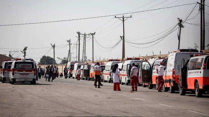 epa10952621 Ambulances with wounded Palestinians arrive at the Rafah border crossing between the Gaza Strip and Egypt, in Gaza, 01 November 2023. Ambulances carrying evacuees from the Gaza Strip were driven through the border crossing at Rafah on 01 November. As per the agreement made by Egypt, Israel, and Hamas, a number of foreign nationals and individuals with critical injuries will be permitted to evacuate the besieged territory. More than 8,500 Palestinians and at least 1,400 Israelis have been killed, according to the Israel Defense Forces (IDF) and the Palestinian health authority, since Hamas militants launched an attack against Israel from the Gaza Strip on 07 October, and the Israeli operations in Gaza and the West Bank which followed it. EPA/HAITHAM IMAD
