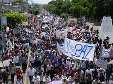 epa11603104 People participate in a demonstration for peace, and against drug violence, in Tuxtla Gutierrez, Chiapas state, Mexico, 13 September 2024. Some 10,000 people from different ethnic groups in the Mexican state of Chiapas (southeast), human rights defenders, retired teachers, transport workers and the state's Catholic Church held a march to demand that the Mexican government put an end to the drug violence that has increased in recent months in the region. EPA/Carlos López