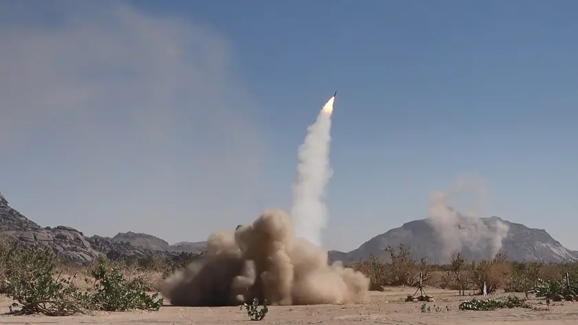 epa11074271 A handout photo made available by the Houthis Media Center on 13 January 2024 shows a projectile being launched during a military exercise near the Yemen-Saudi Arabia border at Al-Baqaa area in the northern province of Saada, Yemen, 11 January 2024. The Houthi-run al-Masirah TV has reported that new airstrikes were carried out on 13 January 2024 on a Houthi military site in Sana'a, a day after the United States and Britain carried out military strikes on several Houthis-controlled sites in Yemen in response to recent Houthis attacks on ships in the Red Sea. The US Department of Defense in December 2023 announced a multinational operation to safeguard trade and to protect ships in the Red Sea amid the recent escalation in Houthi attacks. Houthis vowed to attack Israeli-bound ships and prevent them from navigating in the Red Sea and the Bab al-Mandab Strait in retaliation for Israel's airstrikes on the Gaza Strip. EPA/HOUTHIS MEDIA CENTER HANDOUT -- BEST QUALITY AVAILABLE -- HANDOUT EDITORIAL USE ONLY/NO SALES HANDOUT EDITORIAL USE ONLY/NO SALES