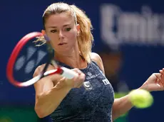 epa10827490 Camila Giorgi of Italy returns to Jessica Pegula of the United States during their first round match at the US Open Tennis Championships at the USTA National Tennis Center in Flushing Meadows, New York, USA, 29 August 2023. The US Open runs from 28 August through 10 September. EPA/WILL OLIVER