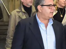 President of Liguria Region, Giovanni Toti (C) questa mattina accompanied by the men of the Guardia di Finanza he leaves his home in Genoa to be accompanied to the barracks in Genoa, Italy, 07 May 2024. Liguria Governor Giovanni Toti was put under house arrest on Tuesday in relation to a probe by finance police and the Genoa DDA anti-mafia directorate. The centre-right regional president is accused of corruption, sources said. ANSA/LUCA ZENNARO