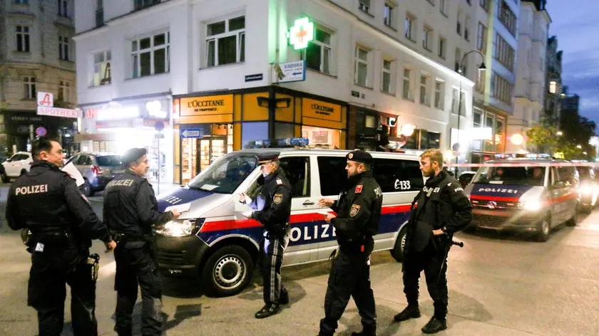 Following gunfire on people enjoying a last evening out before lockdown, police patrol at the scene in Vienna, early Tuesday, Nov. 3, 2020. Police in the Austrian capital said several shots were fired shortly after 8 p.m. local time on Monday, Nov. 2, in a lively street in the city center of Vienna. Austria's top security official said authorities believe there were several gunmen involved and that a police operation was still ongoing. (Photo/Ronald Zak)