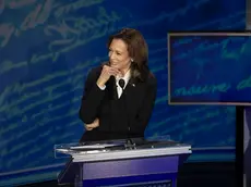 epa11597550 Democratic presidential candidate US Vice President Kamala Harris listens to Republican presidential candidate Donald J. Trump during a presidential debate hosted by ABC News at the National Constitution Center in Philadelphia, Pennsylvania, USA 10 September 2024. The 90 minute event is the only planned debate between the two candidates in the 2024 presidential election. EPA/DEMETRIUS FREEMAN / POOL